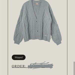 Dusty blue cardigan sweater with V-neck chunky knit and long balloon sleeves